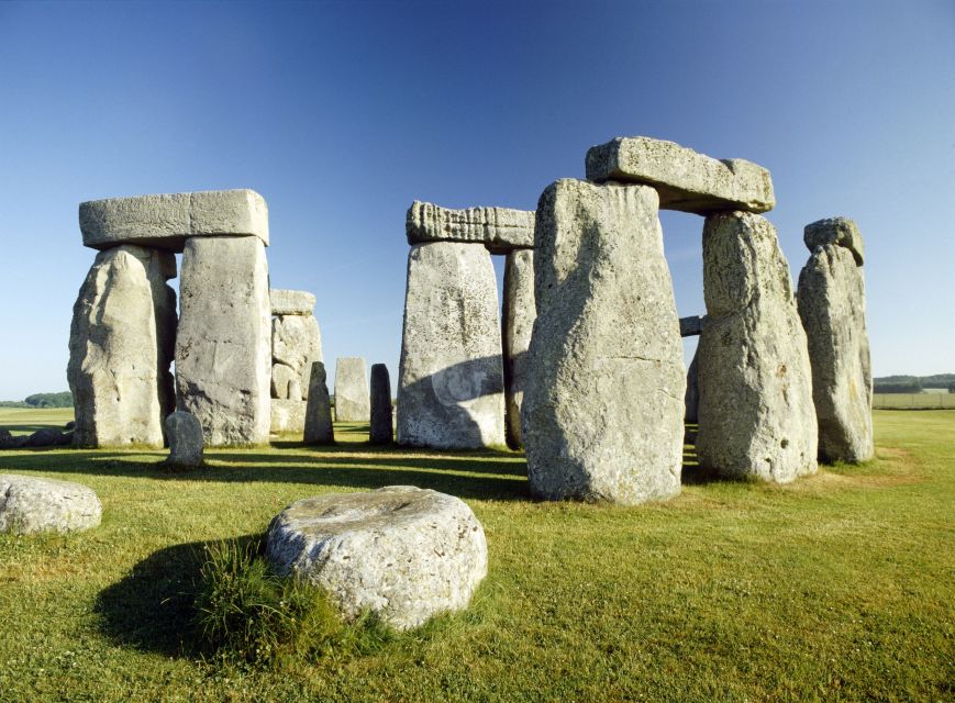 From London: Stonehenge, Windsor and Salisbury Guided Tour - Stonehenge: ancient stones with no final answer
