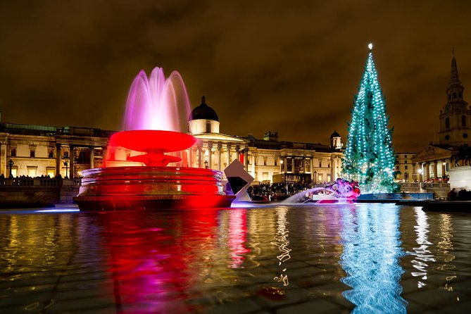 London by Night Bus Tour with Christmas Lights and Live Guide - Piccadilly Circus and the fast-moving city view