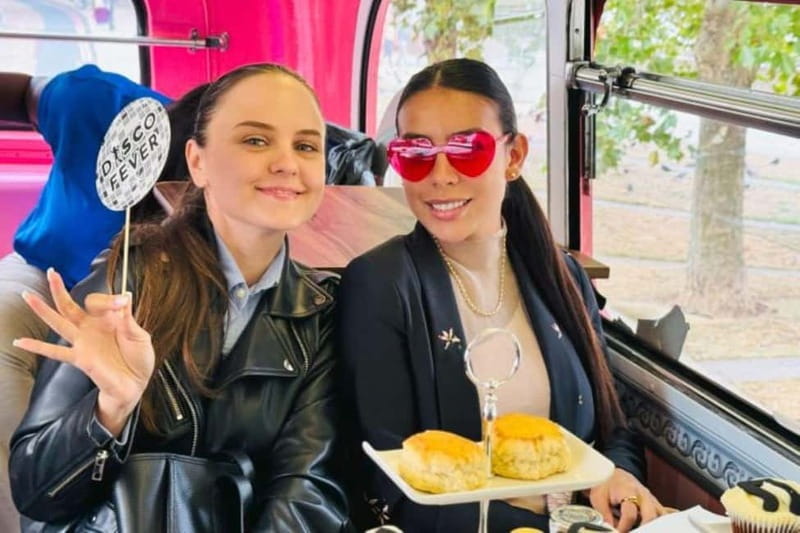 London: "Here We Go Again" Afternoon Tea Bus - The tea service: sandwiches, scones, and something sparkling