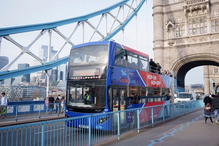 London: Hop-on Hop-off Bus Tour and Madame Tussauds Ticket - Taking the Thames boat from Westminster to the Tower