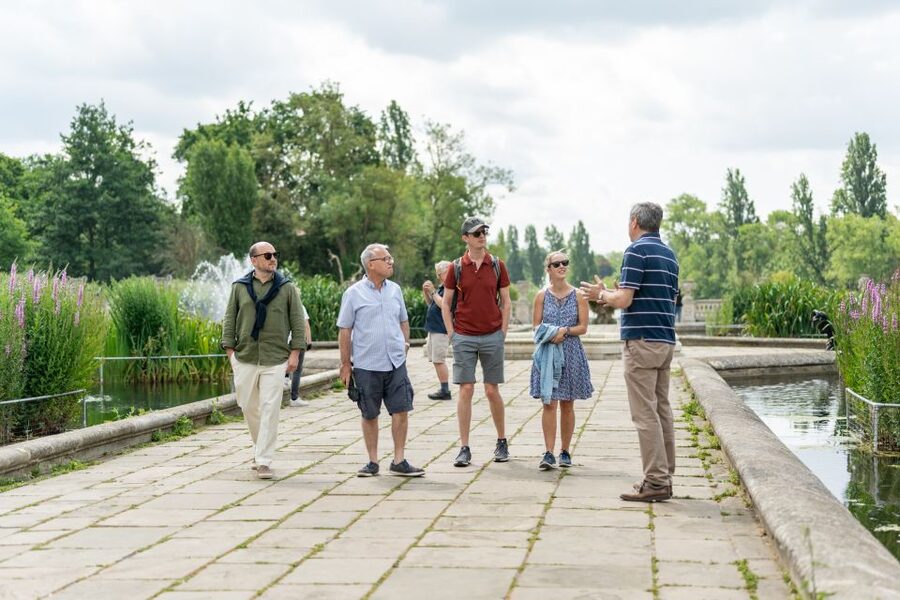 London: Kensington Palace Gardens Tour with Royal High Tea - Walking through Kensington Palace Gardens