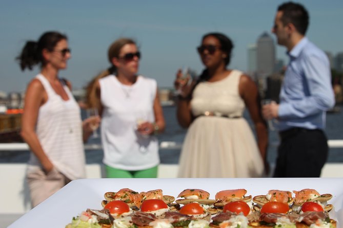 River Thames Evening Cruise with Sparkling wine and Canapés - Westminster, Big Ben, and the London Eye